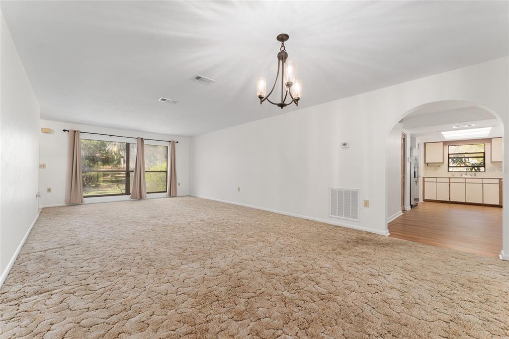 20290 Southwest 97th Place Dunnellon, FL 34431 - Photo 8 of 73 a view of an empty room with a window