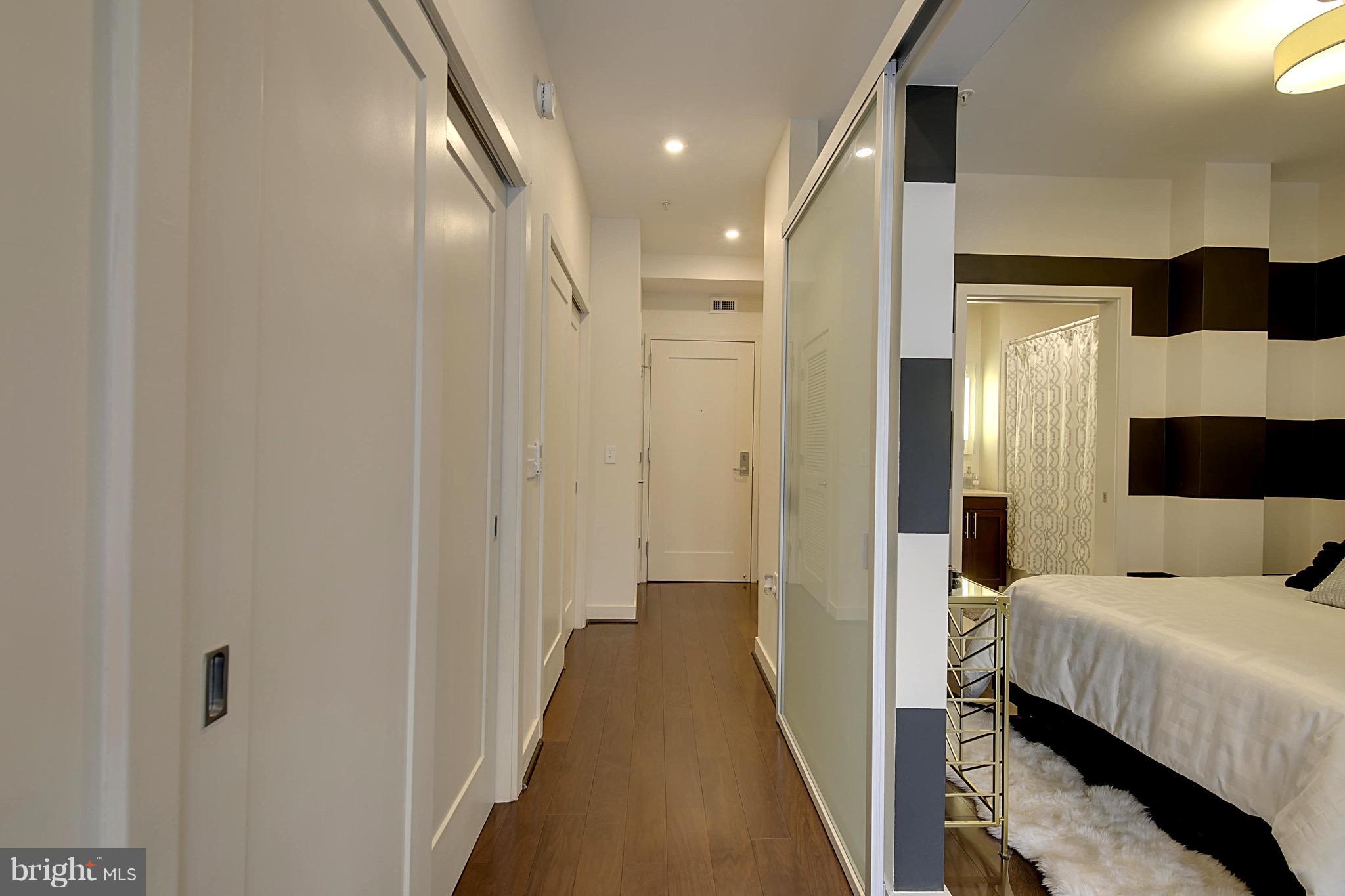 1320 Fenwick Lane, Unit 206 Silver Spring, MD 20910 - Photo 5 of 25 Hallway with a charging station