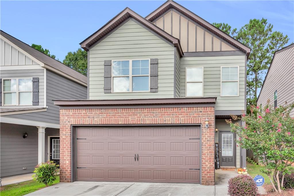 17 Longleaf Circle Fairburn, GA 30213 - Photo 1 of 1 a front view of a house with a yard and garage