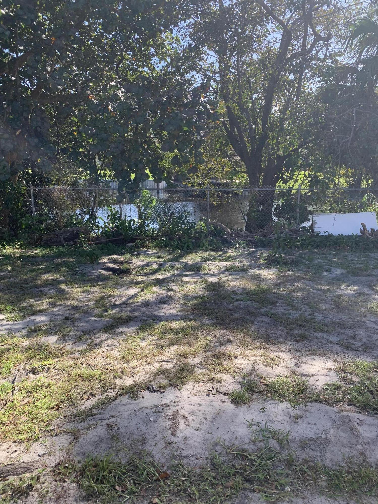 1014 Old Boynton Road Boynton Beach, FL 33426 - Photo 4 of 10 a view of a yard with trees