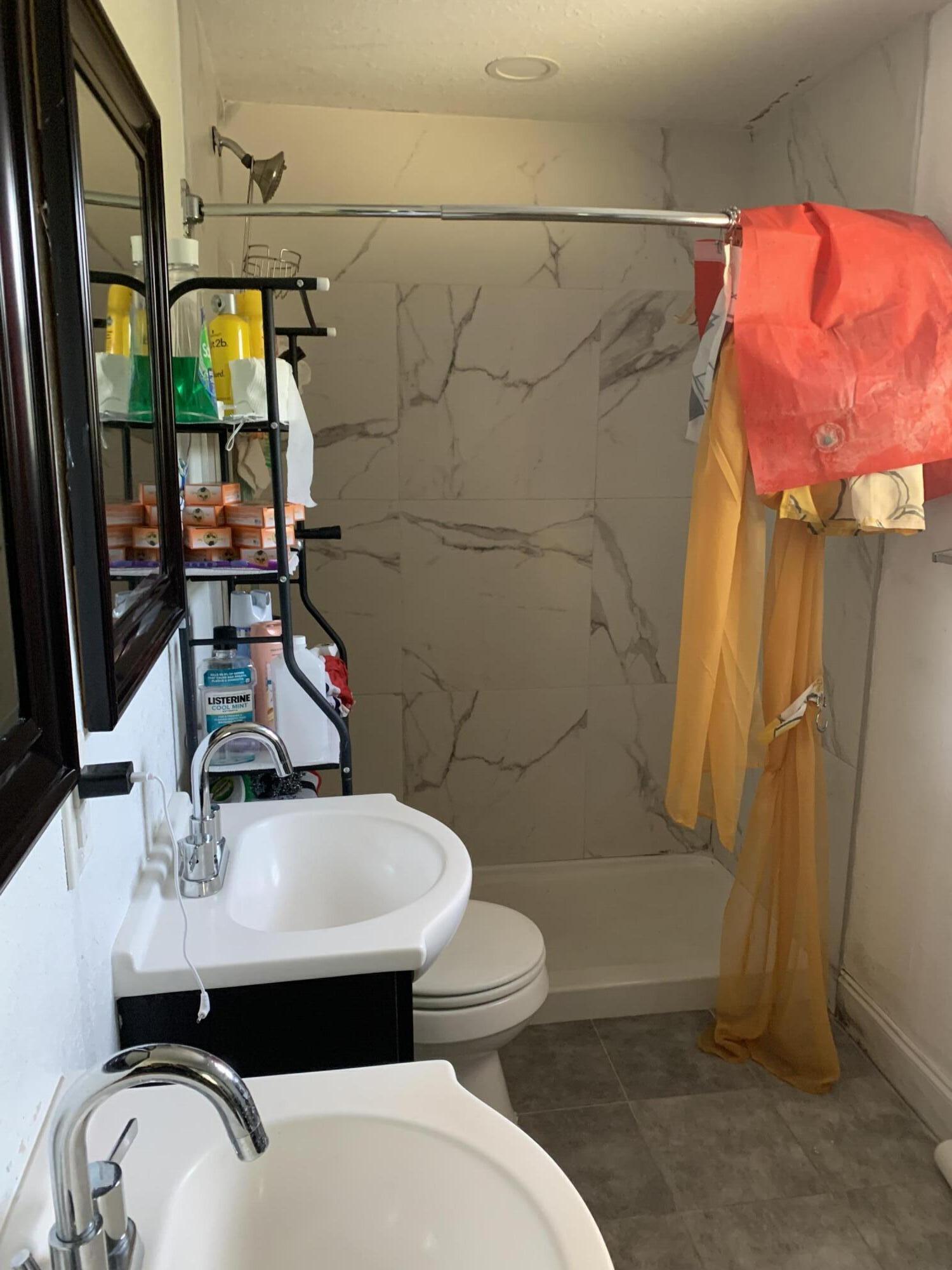 1014 Old Boynton Road Boynton Beach, FL 33426 - Photo 10 of 10 a bathroom with a sink toilet and shower