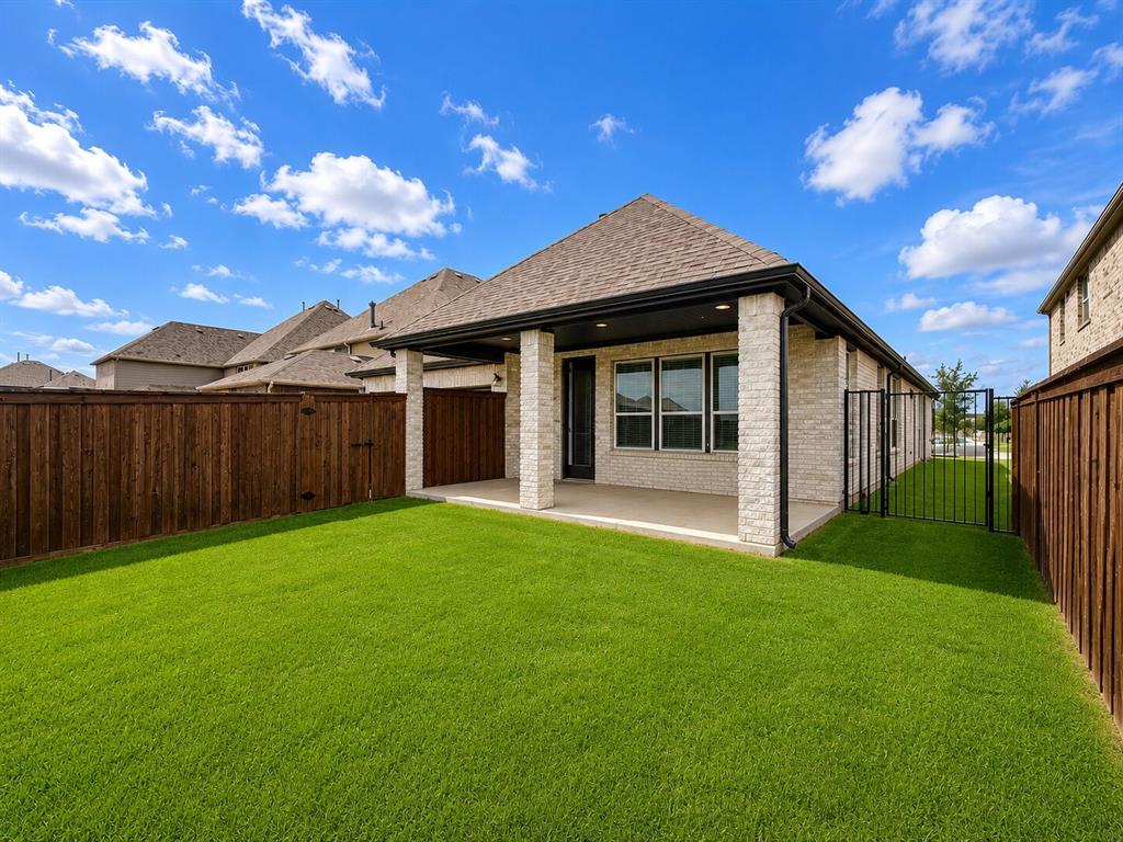 3598 Furrow Road Frisco, TX 75035 - Photo 14 of 14 a view of a house with a yard