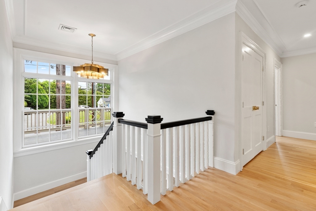 2 Percy Road Lexington, MA 02421 - Photo 16 of 31 a view of a room with wooden floor and white walls