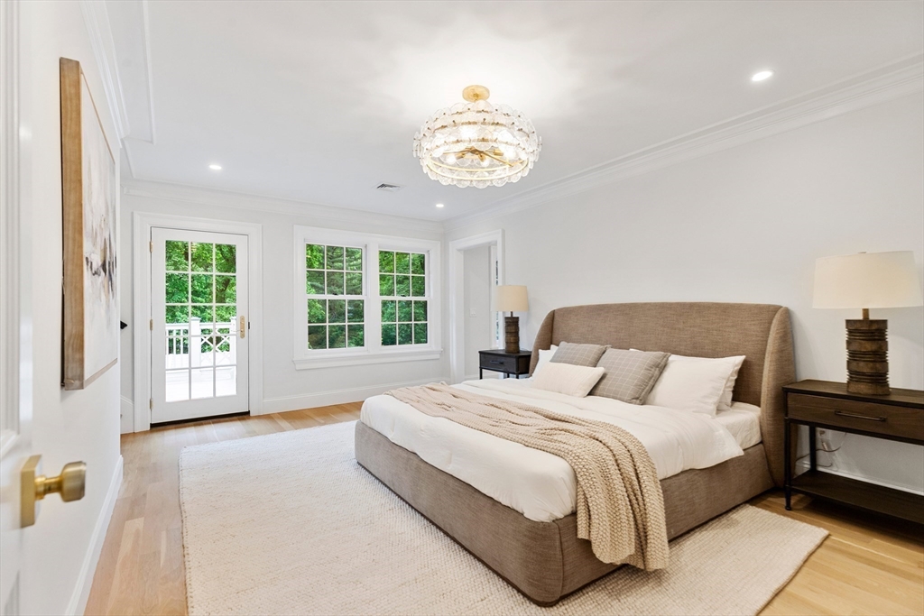 2 Percy Road Lexington, MA 02421 - Photo 17 of 31 a spacious bedroom with a bed and a window