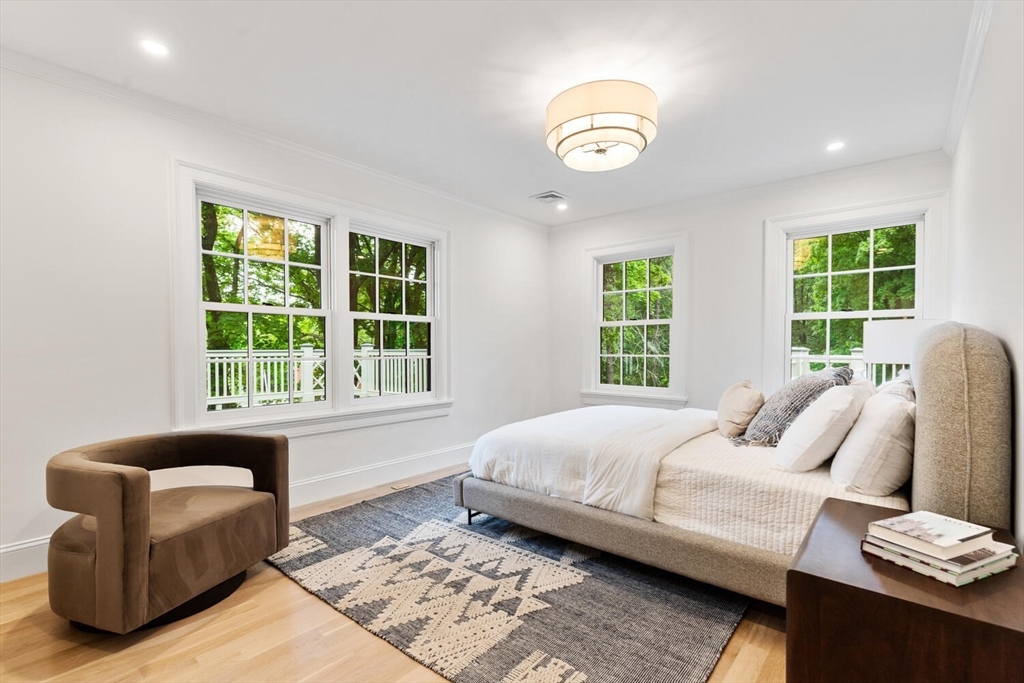 2 Percy Road Lexington, MA 02421 - Photo 23 of 31 a bedroom with a bed and a couch