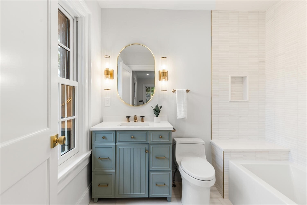 2 Percy Road Lexington, MA 02421 - Photo 24 of 31 a bathroom with a sink a toilet and shower