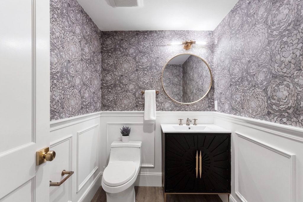 2 Percy Road Lexington, MA 02421 - Photo 26 of 31 a bathroom with a sink toilet and a mirror
