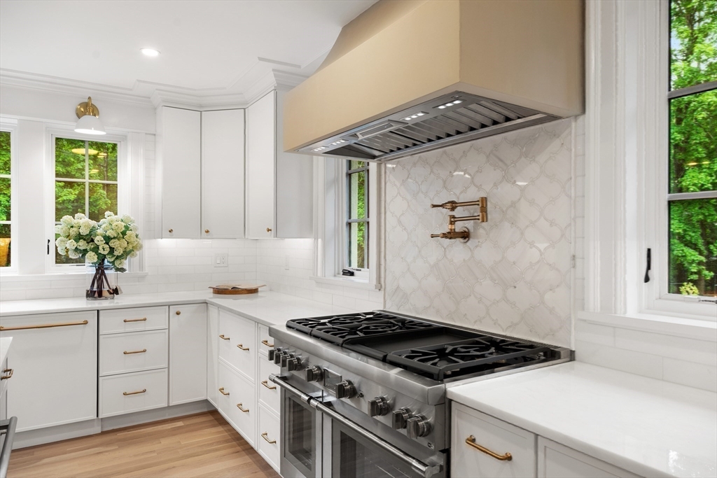 2 Percy Road Lexington, MA 02421 - Photo 5 of 31 a kitchen with a stove and a sink
