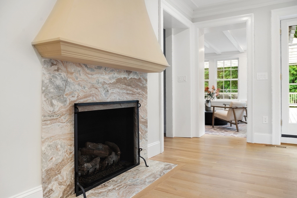 2 Percy Road Lexington, MA 02421 - Photo 8 of 31 a living room with furniture and a fireplace