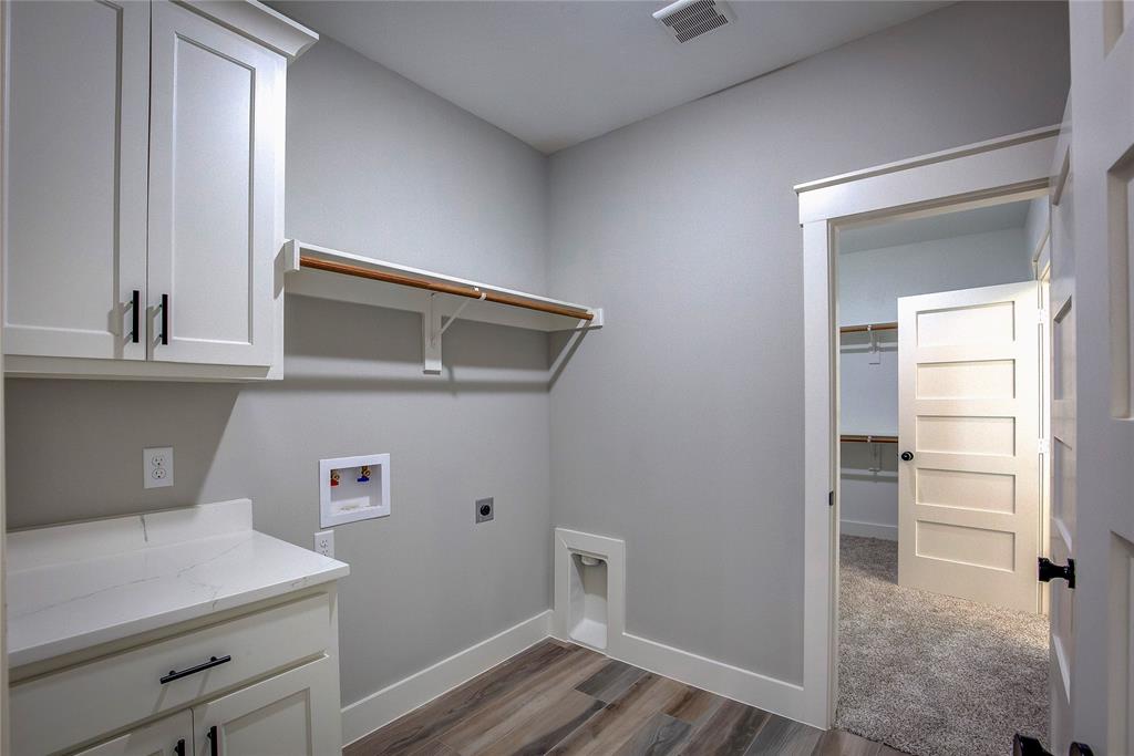 405 Door Key Ranch Road Trinidad, TX 75163 - Photo 22 of 28 Laundry room with cabinets, carpet, electric dryer hookup, and hookup for a washing machine