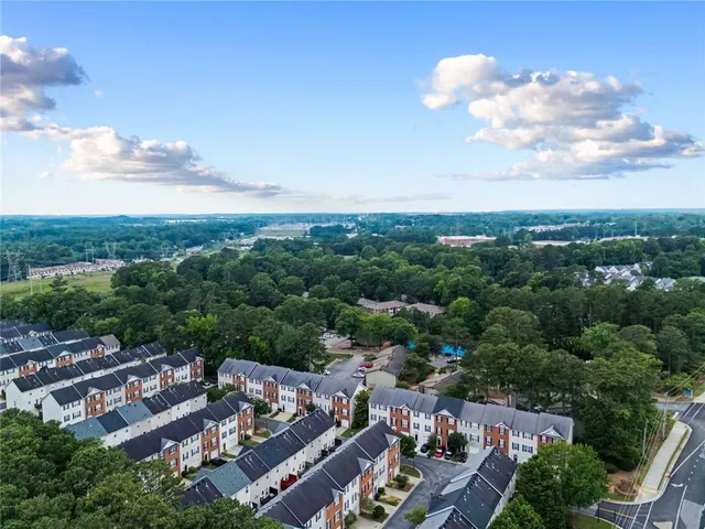 an aerial view of a house with a garden