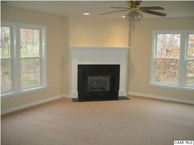 43 Amethyst Road Palmyra, VA 22963 - Photo 23 of 31 an empty room with windows and fireplace