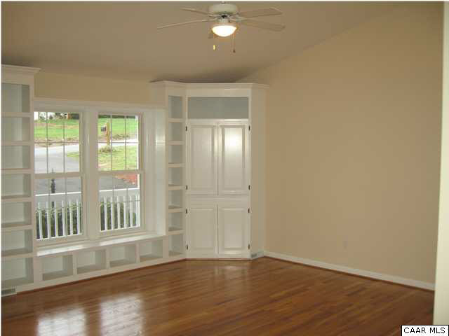 43 Amethyst Road Palmyra, VA 22963 - Photo 3 of 31 an empty room with wooden floor and windows