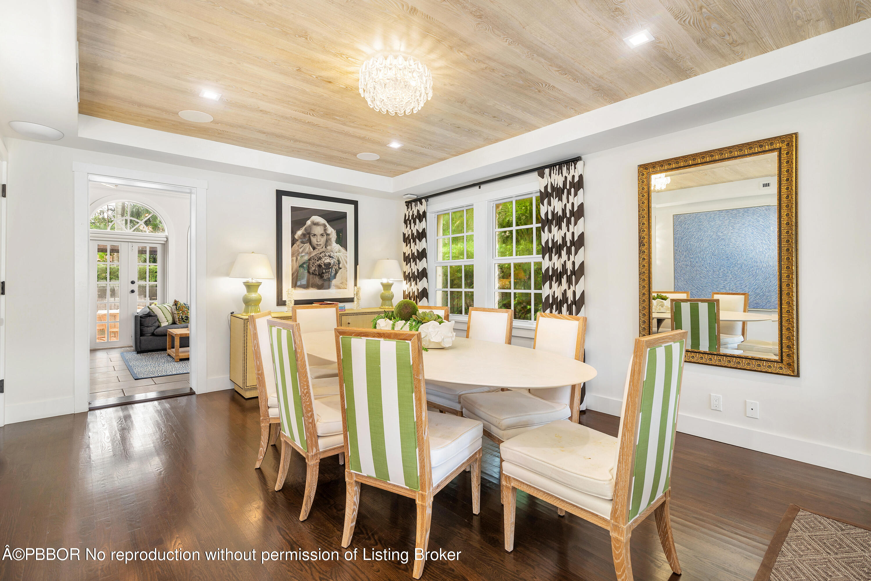 231 Sunset Road West Palm Beach, FL 33401 - Photo 7 of 22 a view of a dining room with furniture window and wooden floor