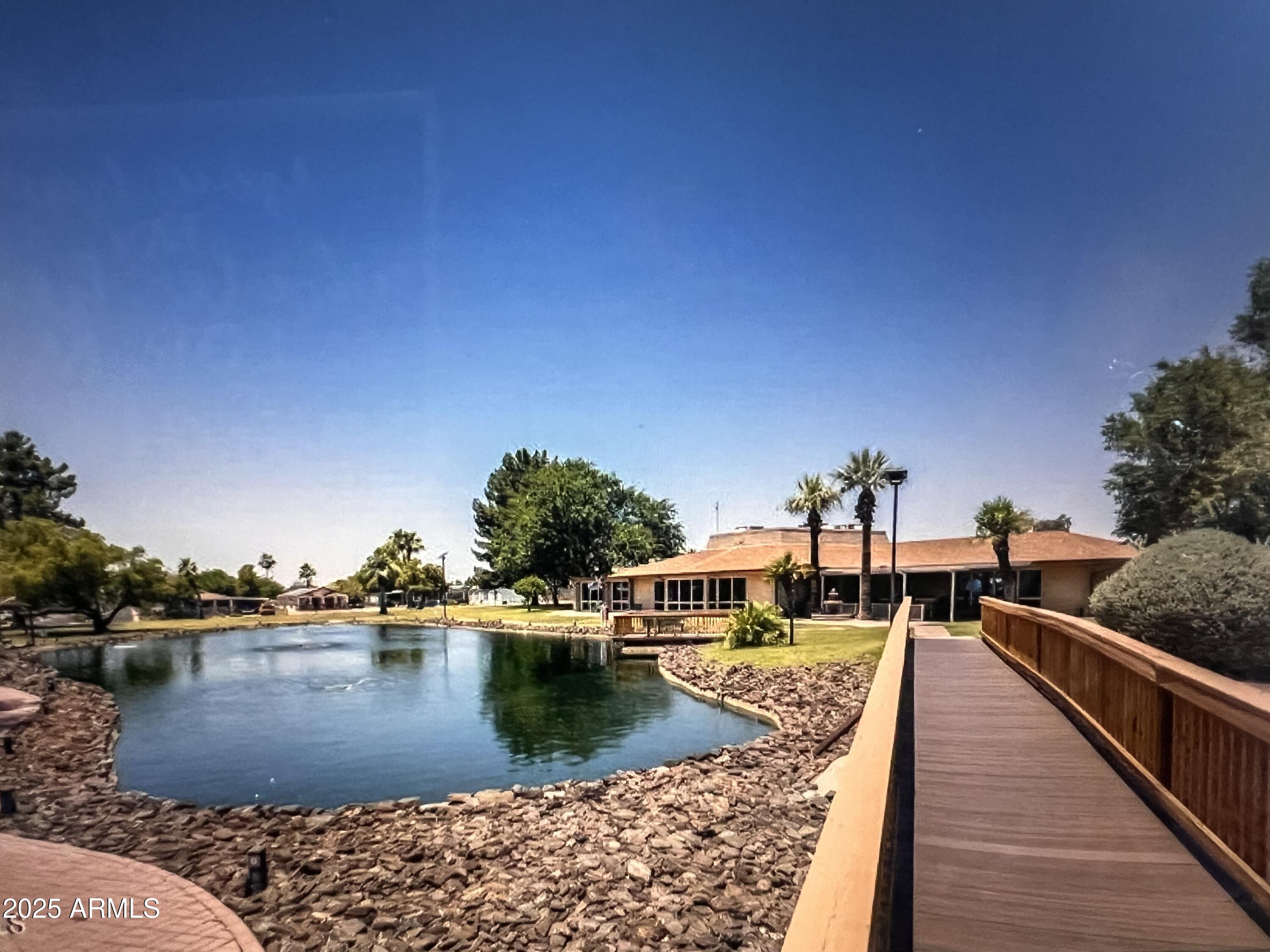 16416 North 33rd Way Phoenix, AZ 85032 - Photo 29 of 31 a view of a lake with outdoor seating