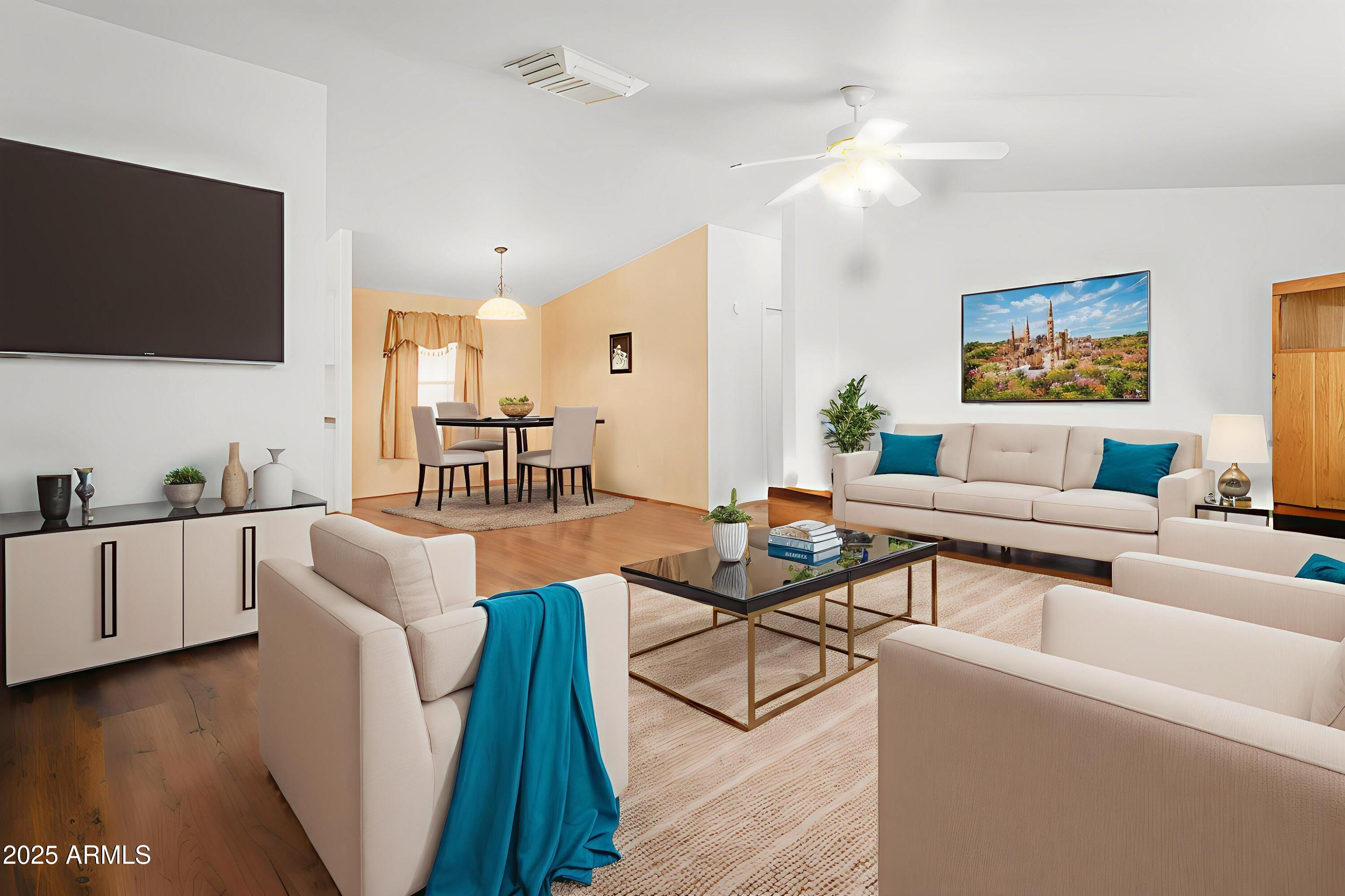 16416 North 33rd Way Phoenix, AZ 85032 - Photo 4 of 31 a living room with fireplace furniture and a flat screen tv
