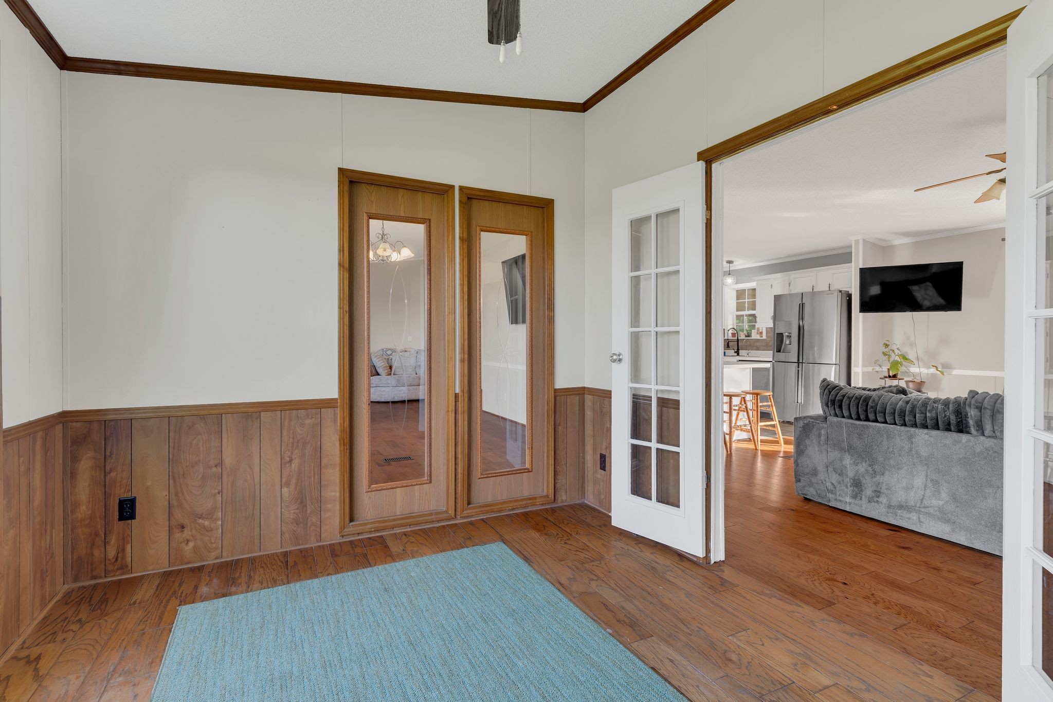 960 Harsh Lane Castalian Springs, TN 37031 - Photo 12 of 51 a view of a hallway with wooden floor and a cabinet