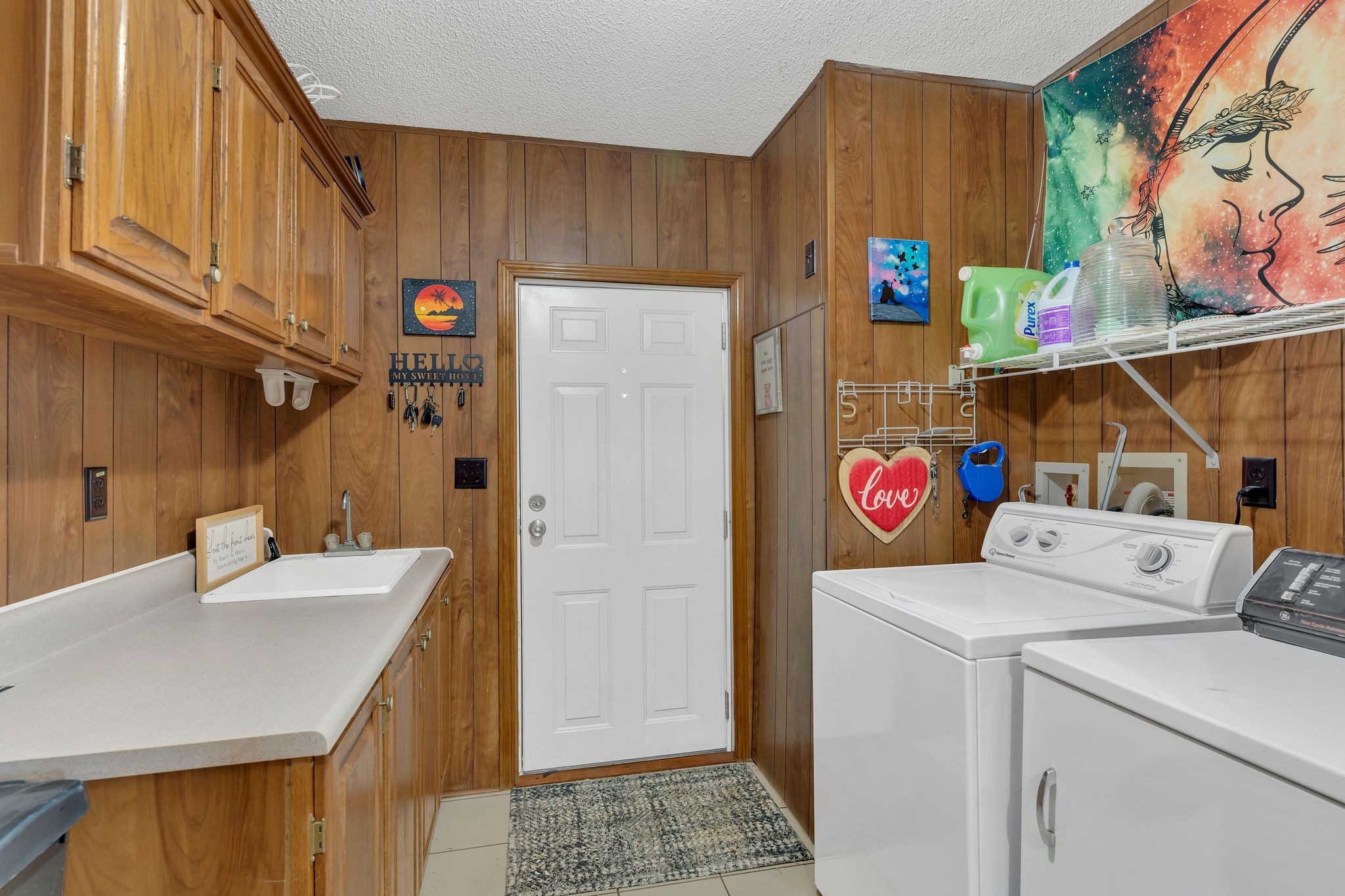 960 Harsh Lane Castalian Springs, TN 37031 - Photo 16 of 51 a utility room with dryer and washer