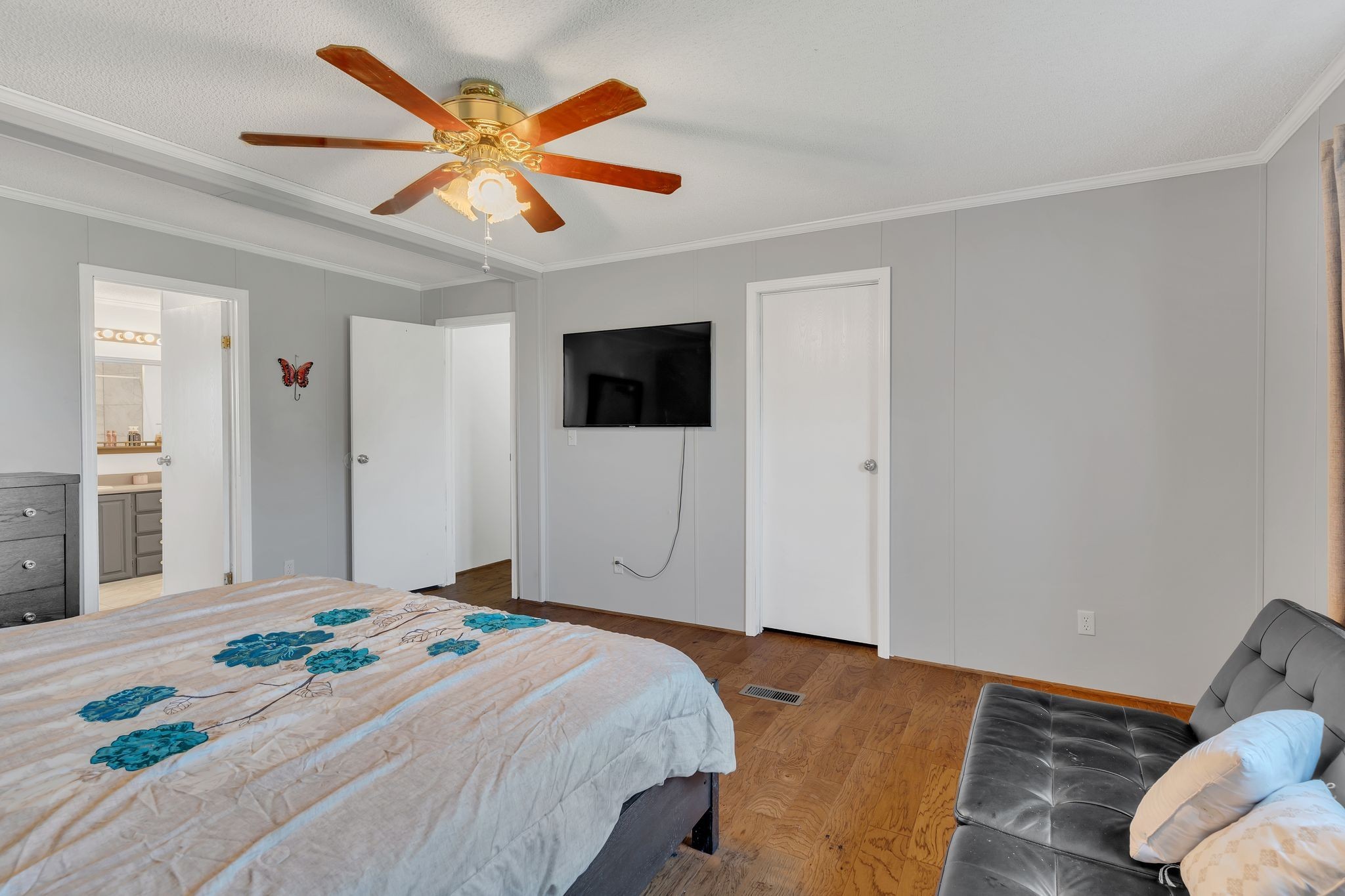 960 Harsh Lane Castalian Springs, TN 37031 - Photo 18 of 51 a bedroom with a bed and a flat screen tv