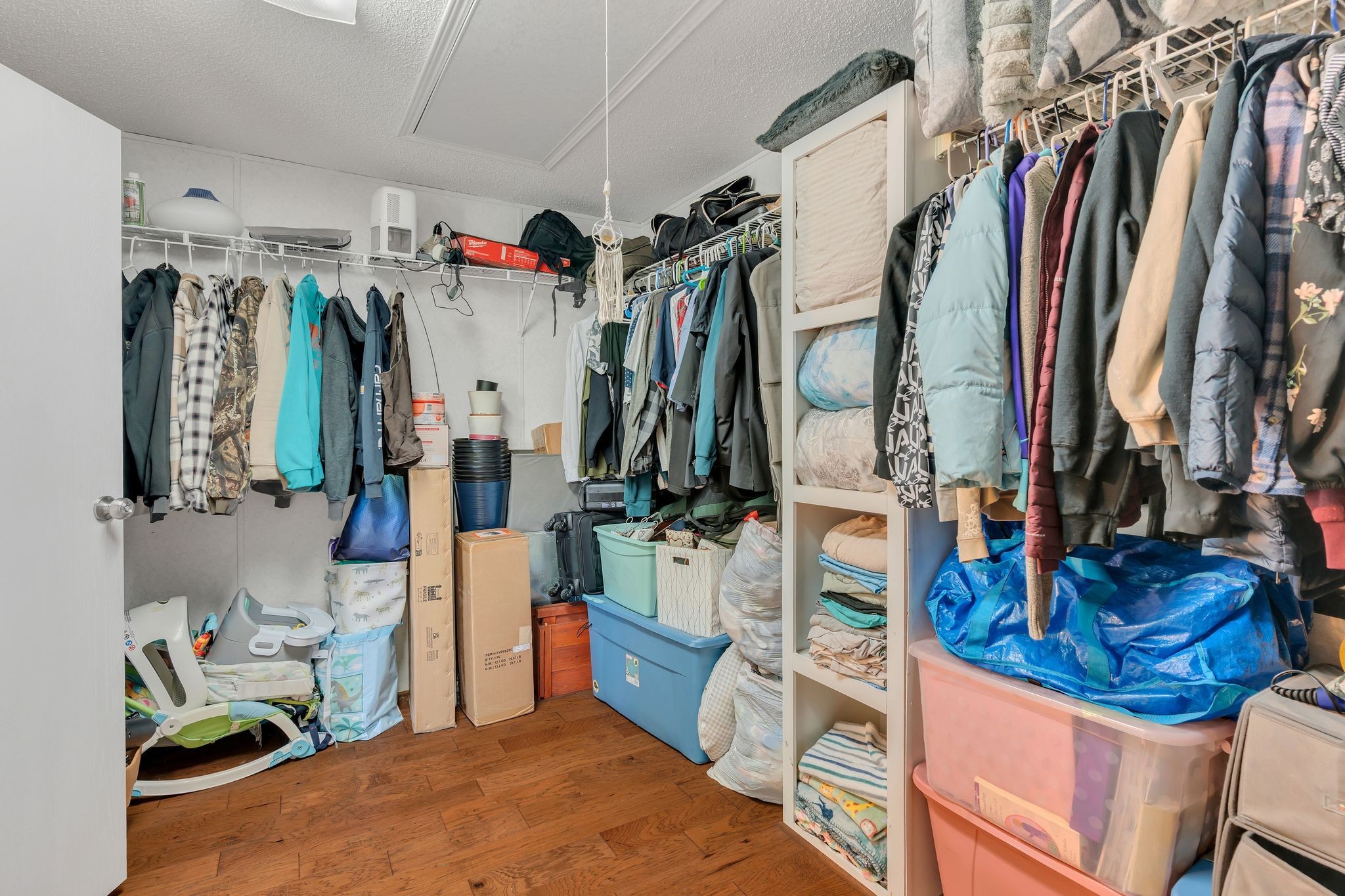 960 Harsh Lane Castalian Springs, TN 37031 - Photo 19 of 51 a view of walk in closet with clothes and shoes