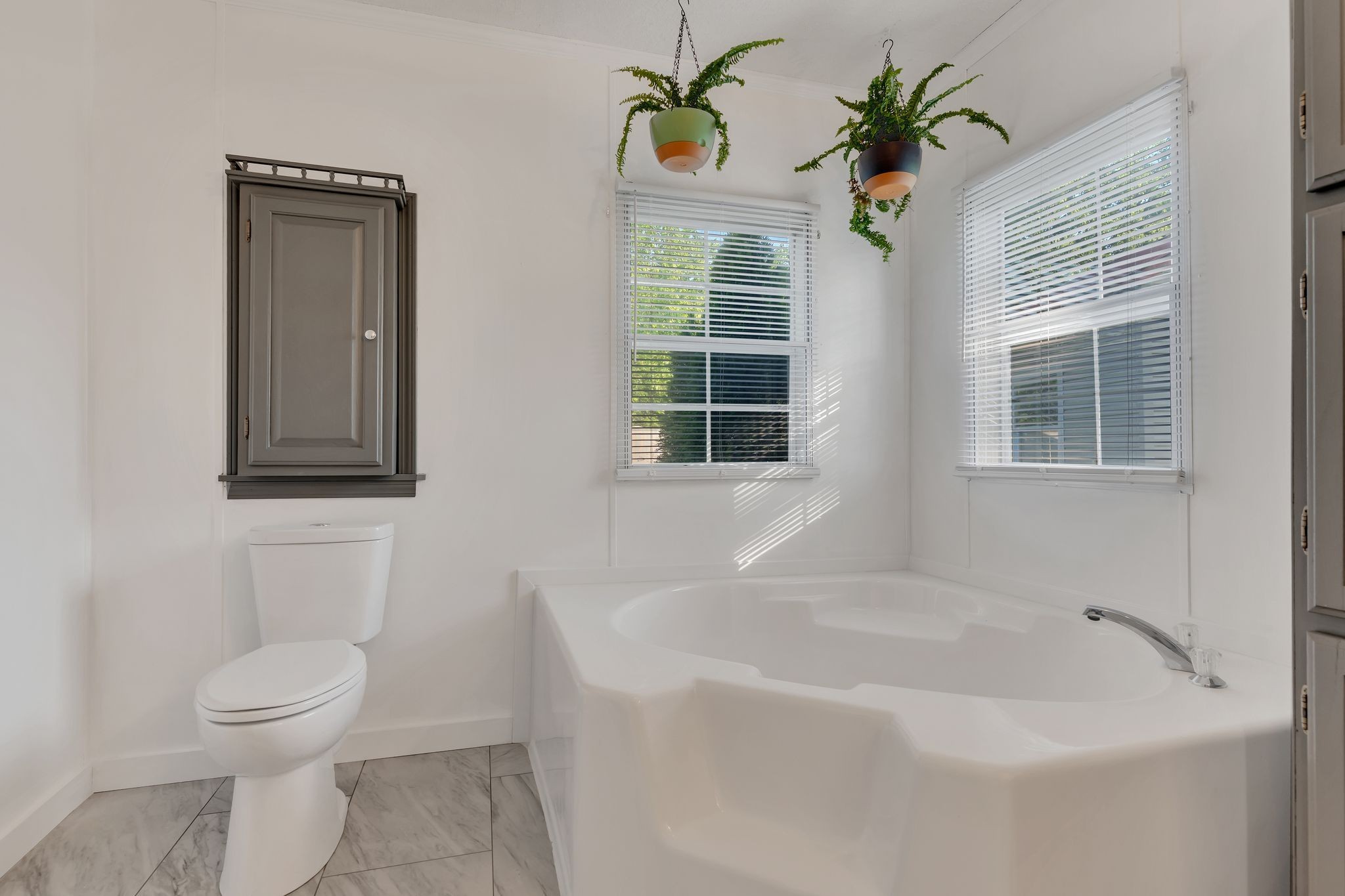 960 Harsh Lane Castalian Springs, TN 37031 - Photo 22 of 51 a bathroom with a toilet sink and mirror