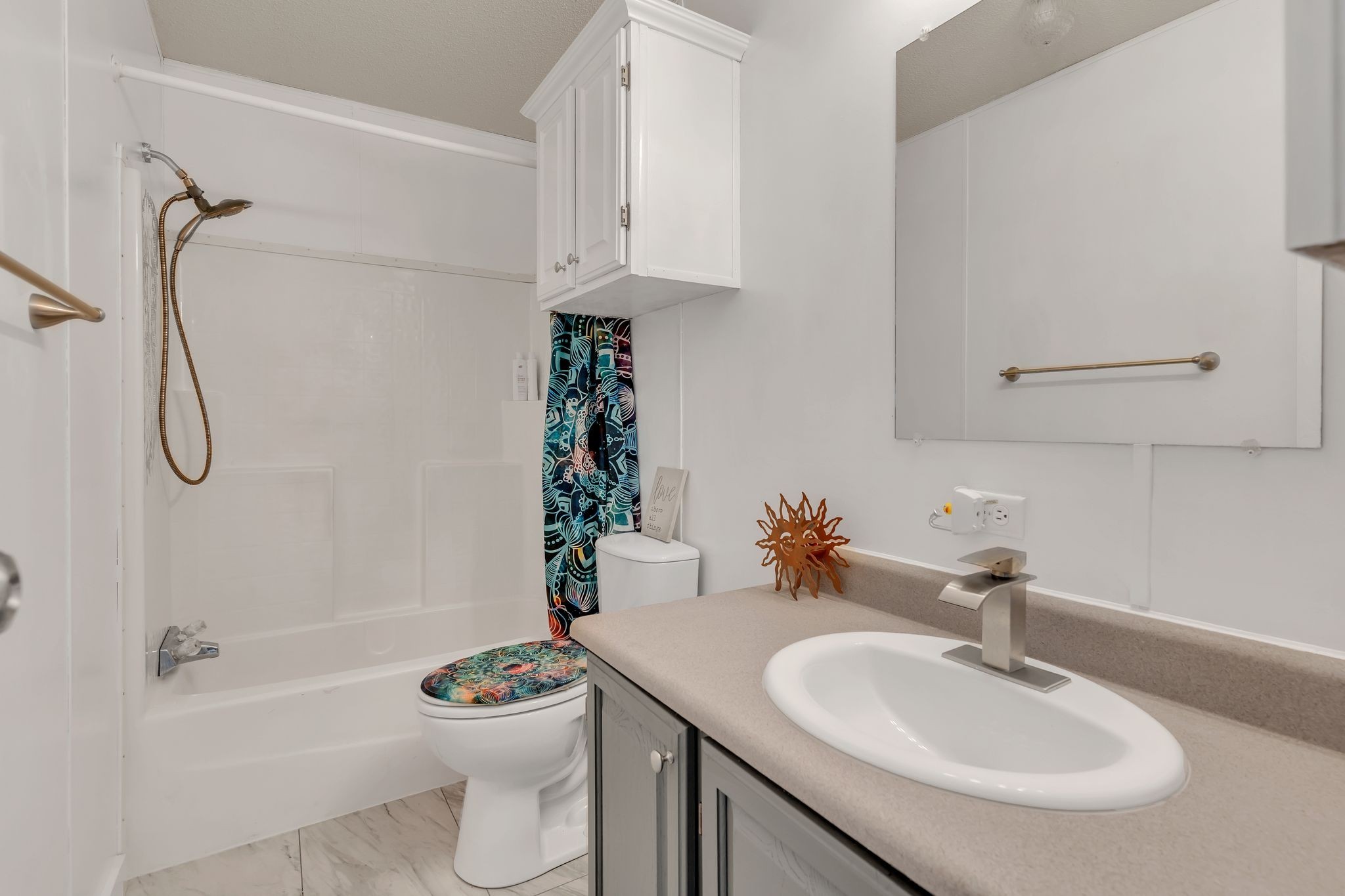 960 Harsh Lane Castalian Springs, TN 37031 - Photo 27 of 51 a bathroom with a sink a toilet and shower