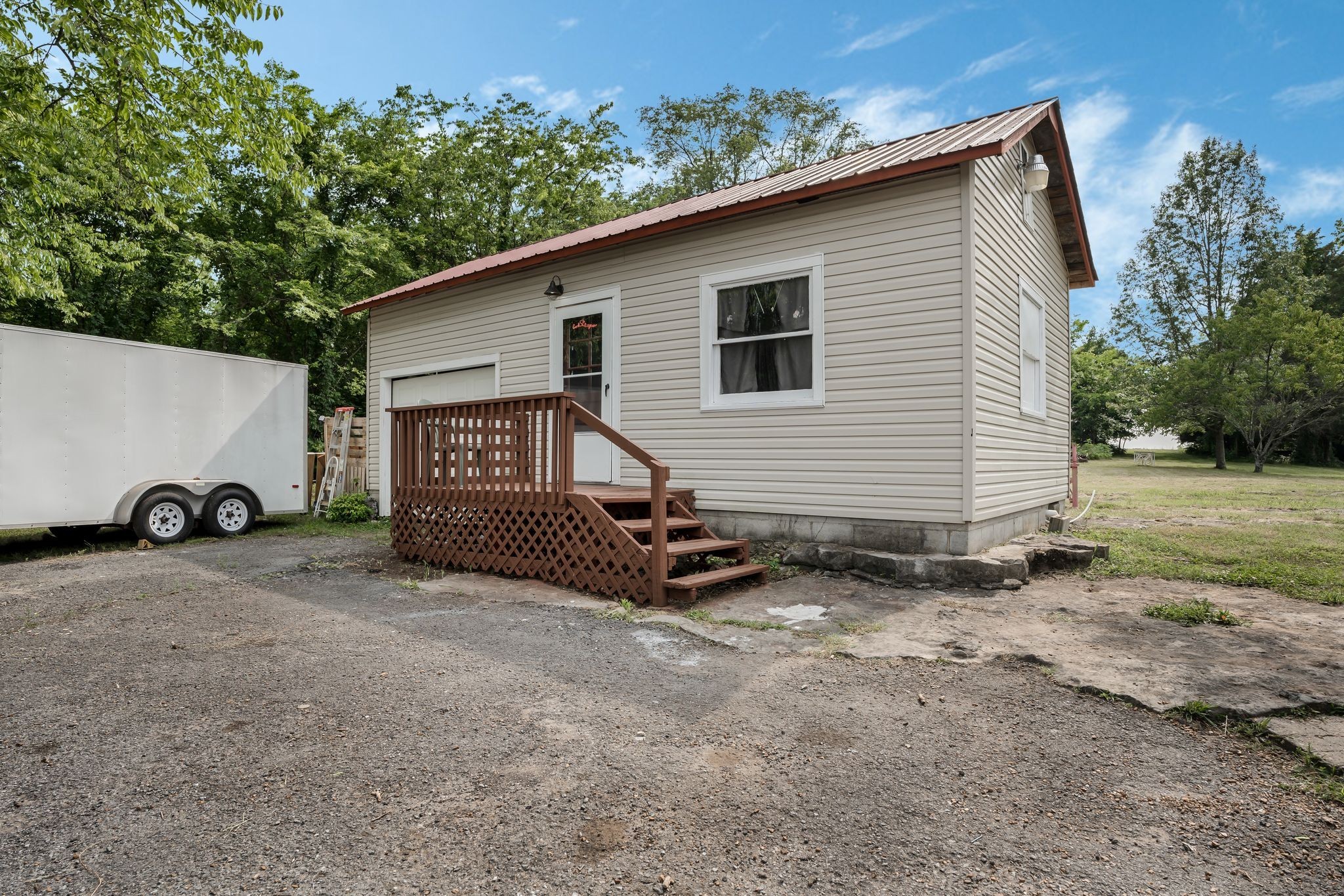 960 Harsh Lane Castalian Springs, TN 37031 - Photo 35 of 51 a view of a house with a yard