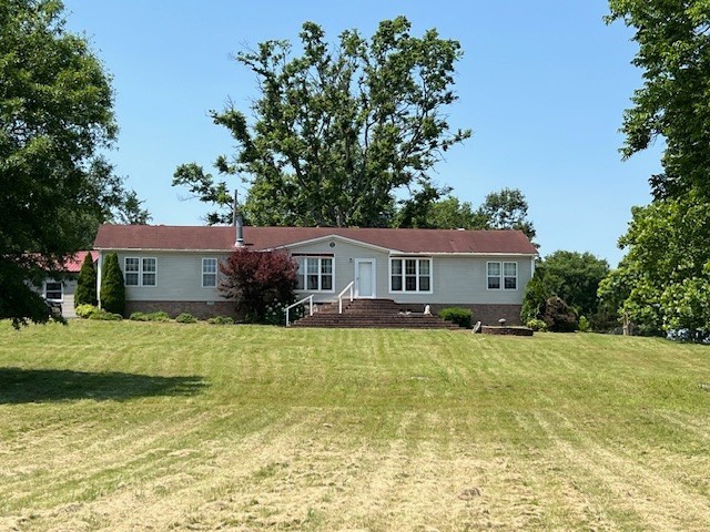 960 Harsh Lane Castalian Springs, TN 37031 - Photo 40 of 51 a view of a house with a swimming pool