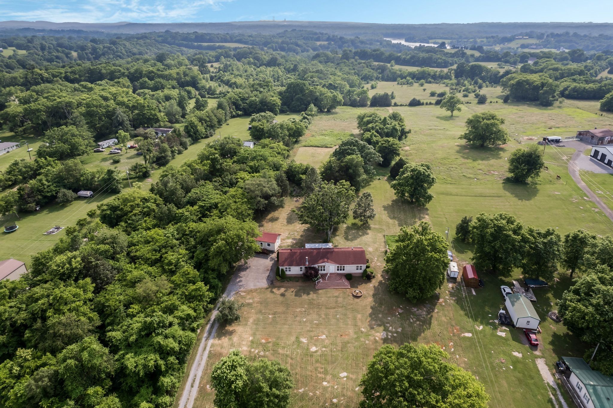 960 Harsh Lane Castalian Springs, TN 37031 - Photo 42 of 51 an aerial view of a houses with a lake view