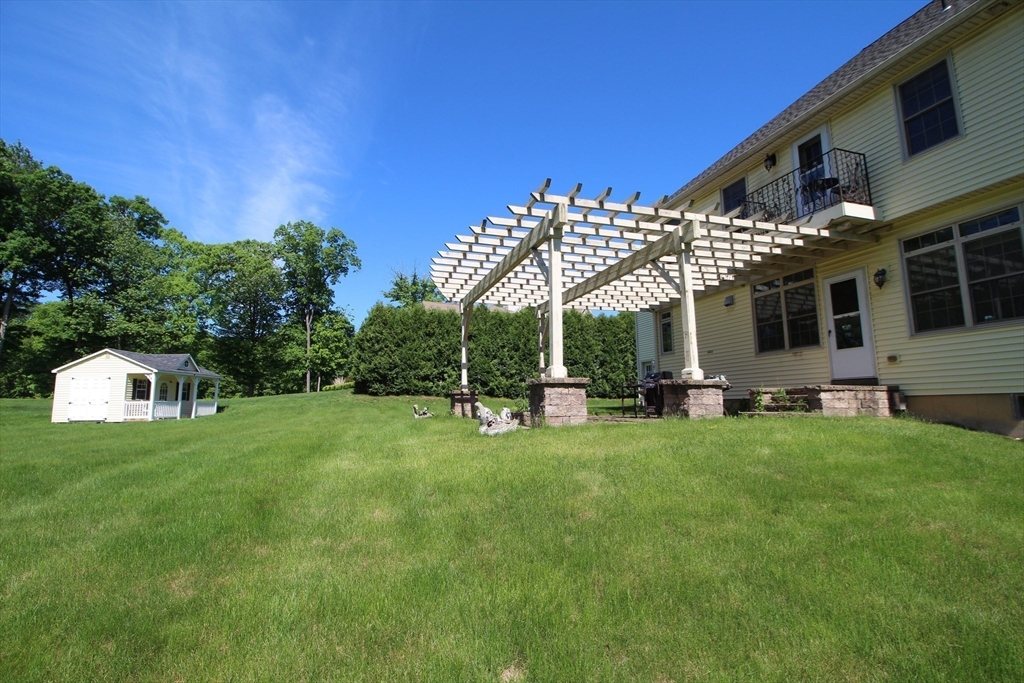 5 Gableview Lane Southwick, MA 01077 - Photo 9 of 41 a view of a house with backyard and sitting area