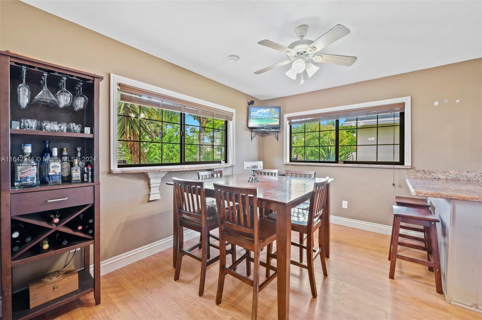 9186 Southwest 2nd Street Boca Raton, FL 33428 - Photo 8 of 32 a view of a dining room with furniture window and outside view
