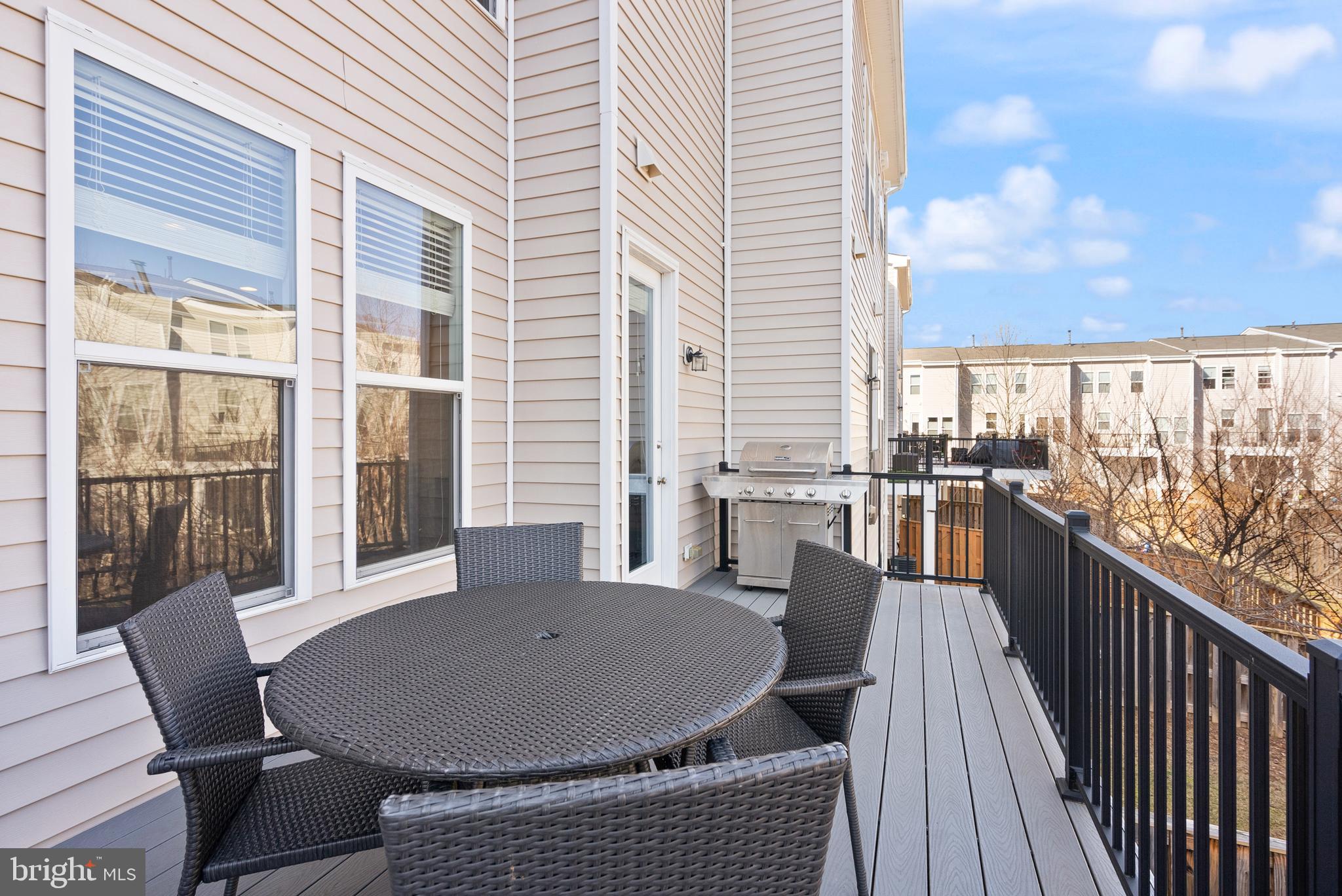 42274 Riggins Ridge Terrace Brambleton, VA 20148 - Photo 13 of 56 swimming pool view with a seating space