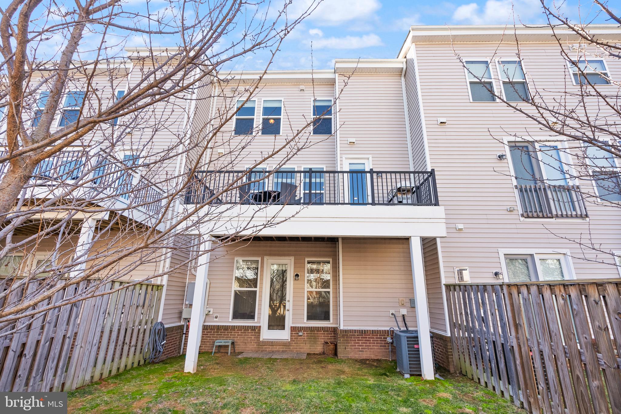 42274 Riggins Ridge Terrace Brambleton, VA 20148 - Photo 48 of 56 a view of a house with a yard