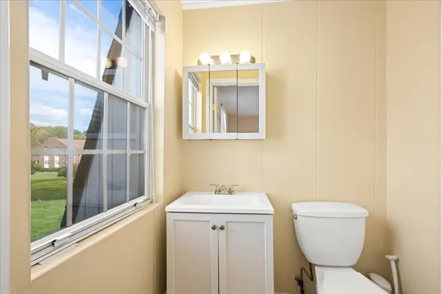 a kitchen with a sink and a stove top oven