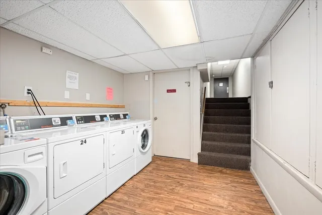 a view of a street with a building in the background