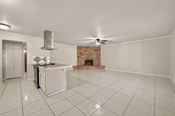 a kitchen with a sink cabinets and appliances