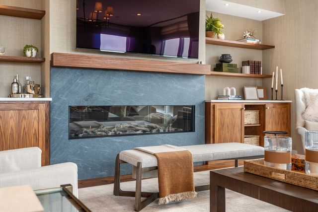 a kitchen with stainless steel appliances wooden cabinets and a counter top space