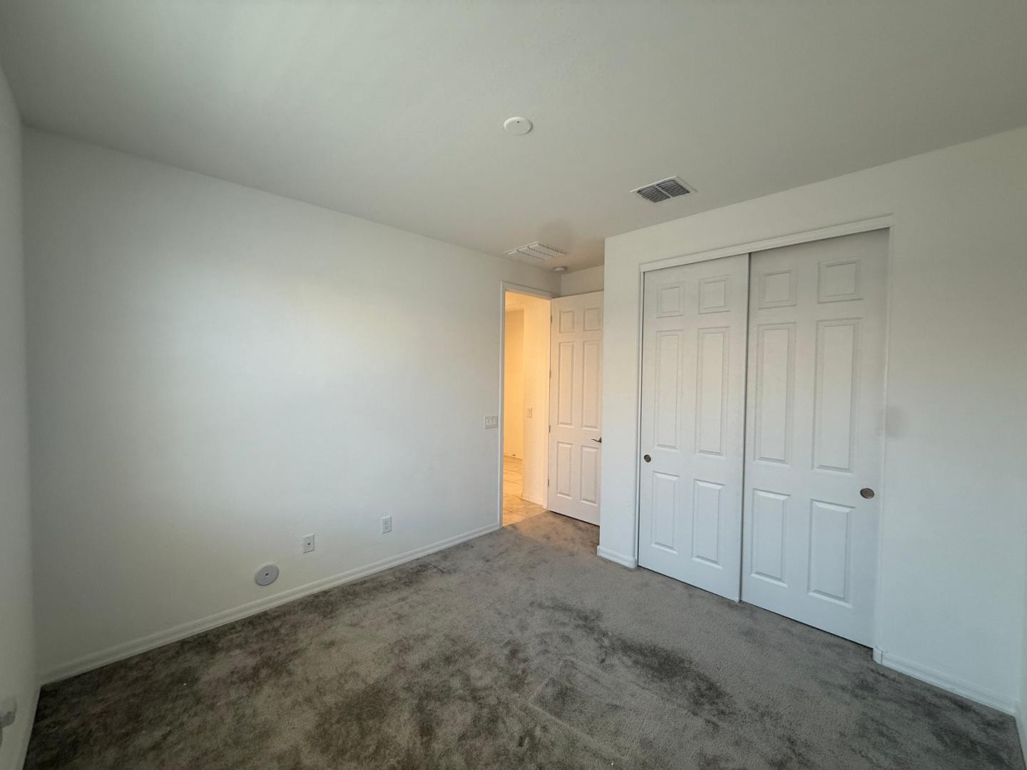 15744 West Jefferson Street Goodyear, AZ 85338 - Photo 8 of 26 a view of an empty room and entryway