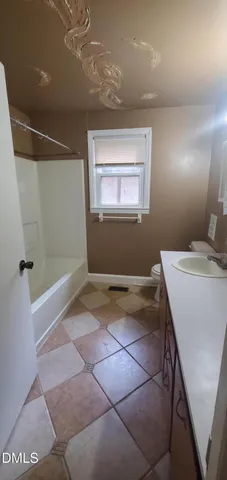 a view of livingroom with washer and dryer