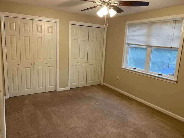 a view of a building with a street