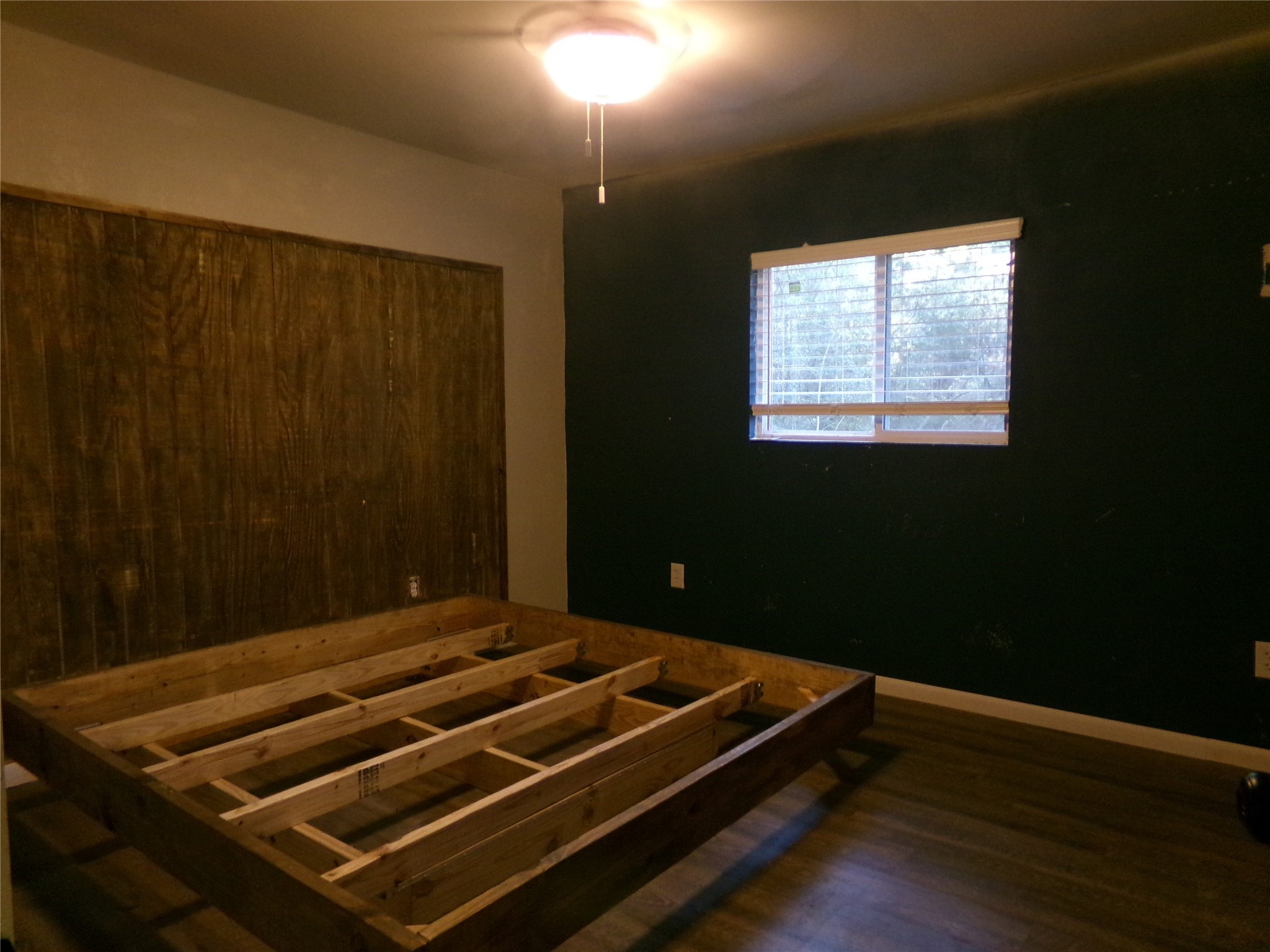1380 Cardinal Lane Trinity, TX 75862 - Photo 9 of 12 a wooden bench sitting in a room