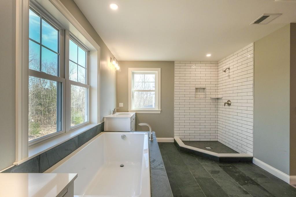 38 Michael Road Wayland, MA 01778 - Photo 17 of 27 a view of a bedroom with furniture and windows