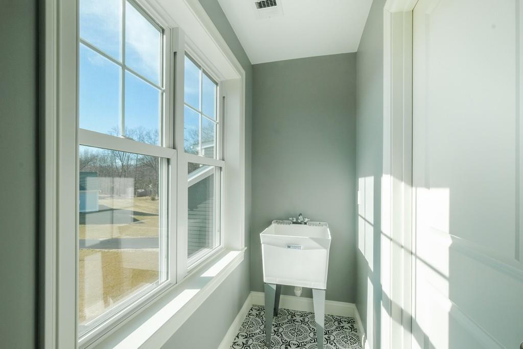38 Michael Road Wayland, MA 01778 - Photo 19 of 27 a bathroom with a sink toilet and a mirror
