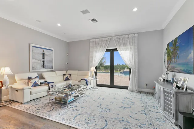 a living room with furniture and a table