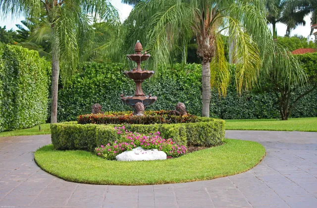 a view of a garden with a fountain