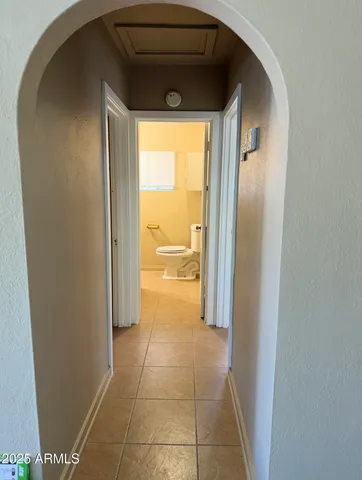 a view of kitchen with furniture and a window