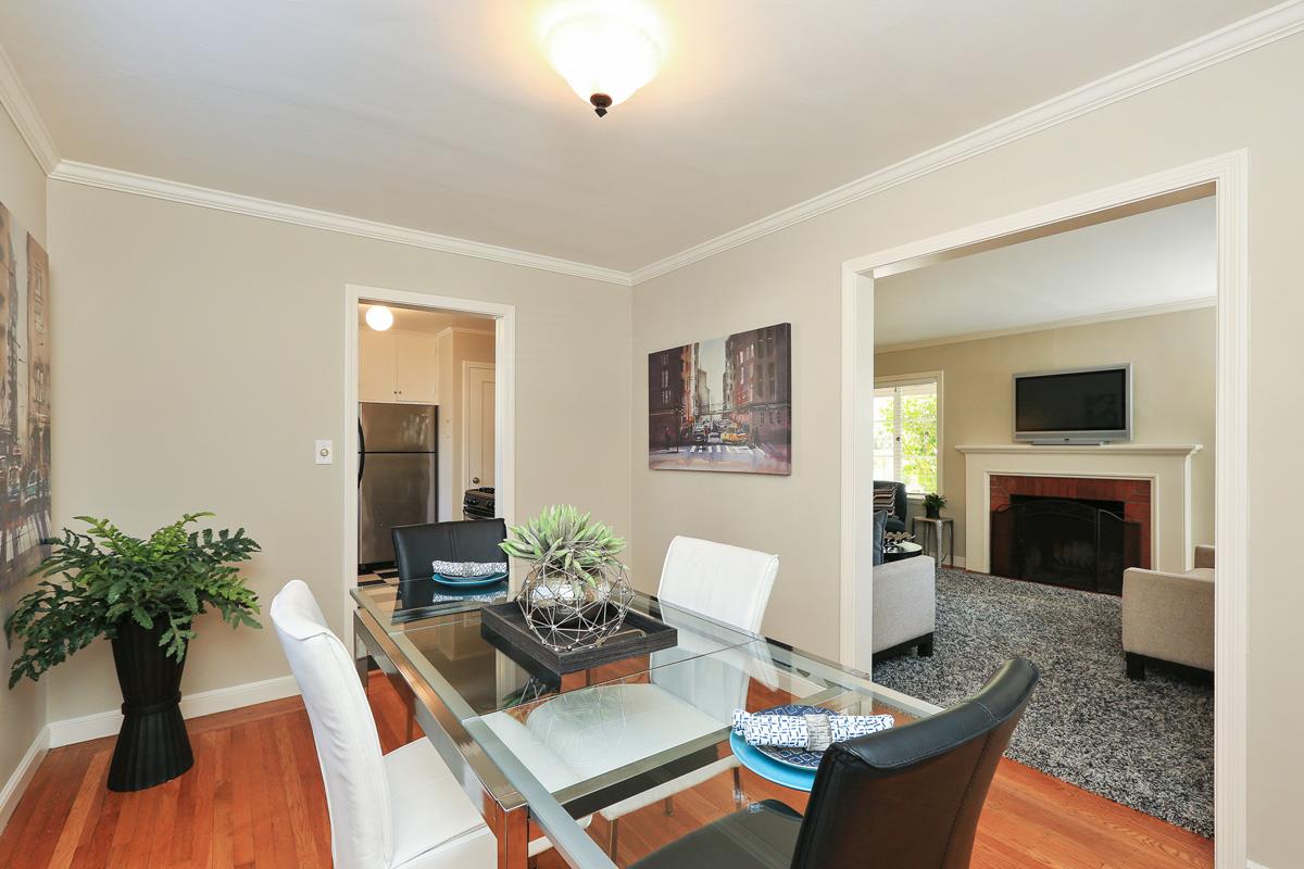 3 Victoria Road Burlingame, CA 94010 - Photo 12 of 31 a living room with furniture and a fireplace