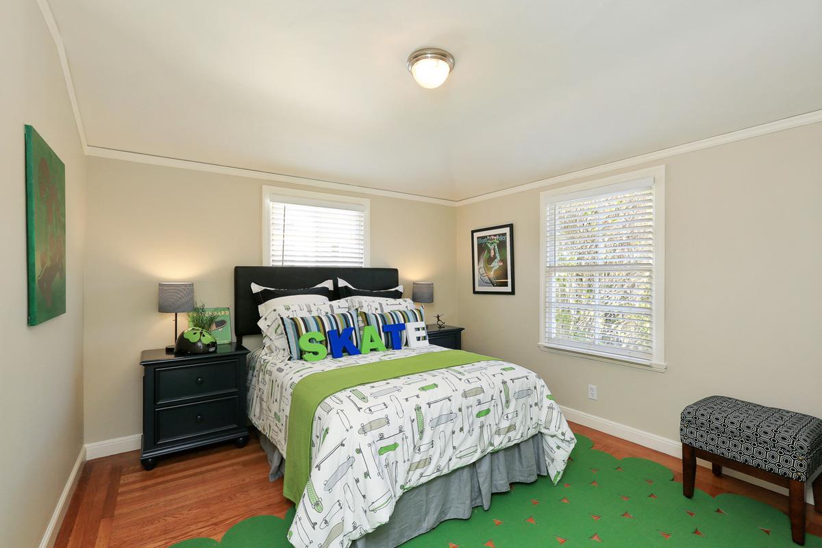3 Victoria Road Burlingame, CA 94010 - Photo 21 of 31 a bedroom with a bed lamp and a window