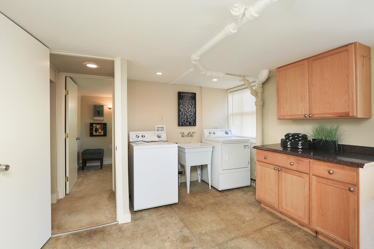 3 Victoria Road Burlingame, CA 94010 - Photo 27 of 31 a kitchen with white cabinets and white appliances