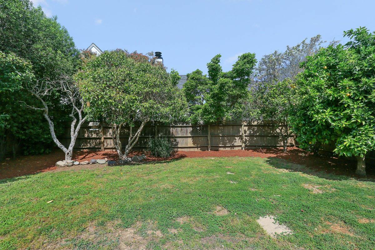 3 Victoria Road Burlingame, CA 94010 - Photo 31 of 31 a view of a backyard with a sitting area and slide